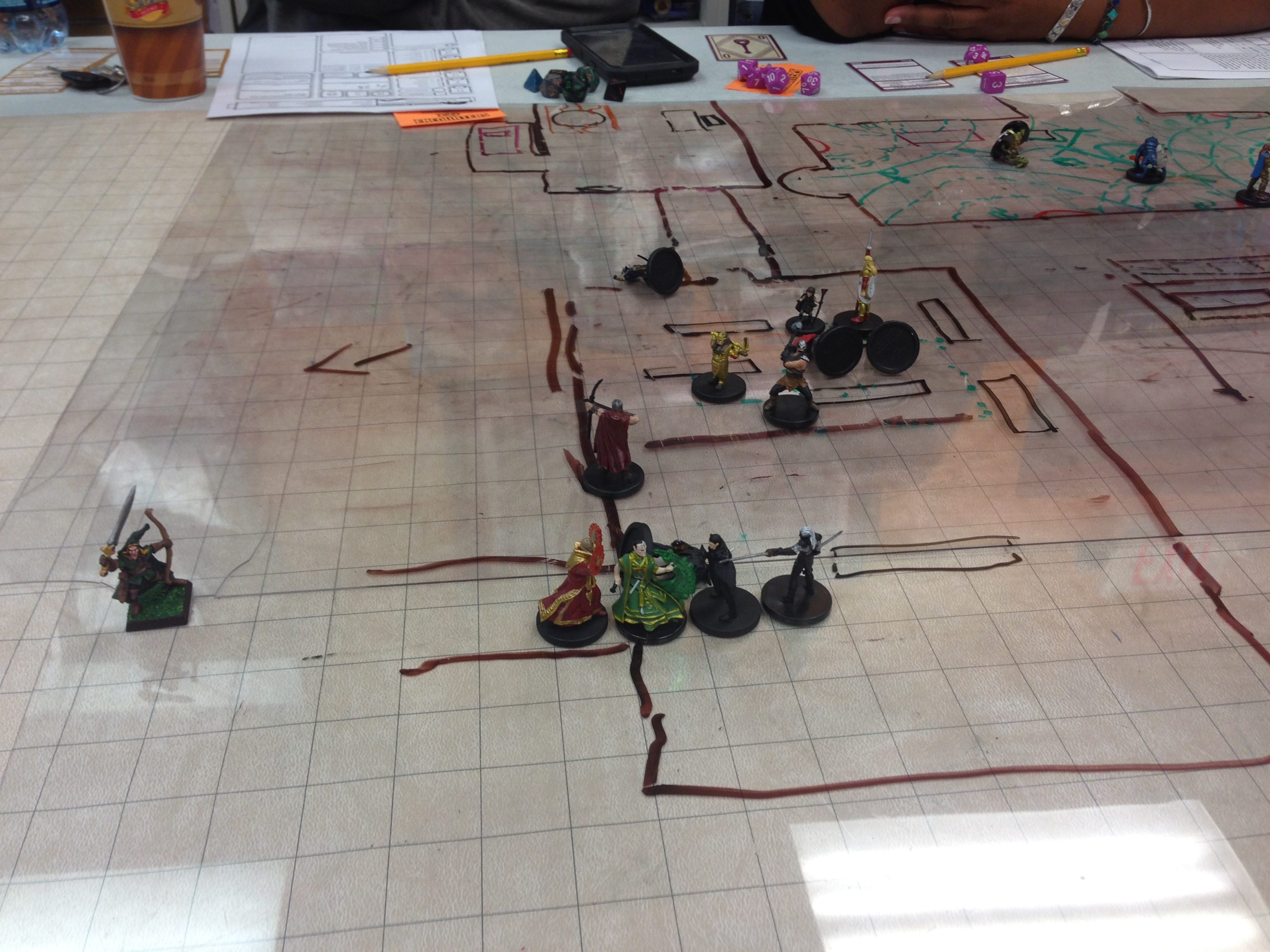 Both guards and the female cleric close in. I sleep them, but she wakes one up. Then we take some damage.