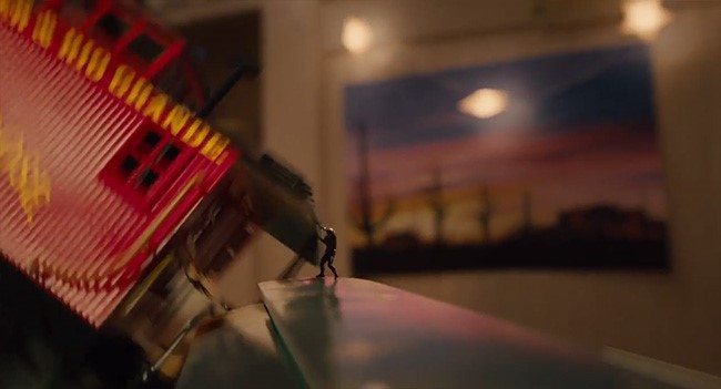 Fig. 3:  Ant-Man throwing a toy train.