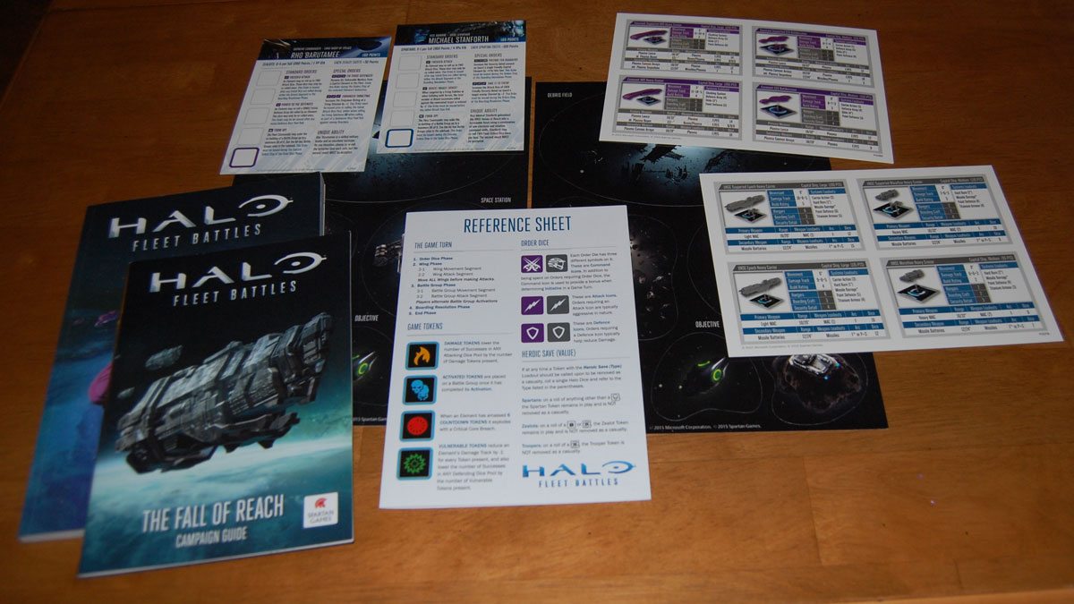 'Halo: Fleet Battles' rule book, campaign guide, terrain, and reference sheets. Photo by Rob Huddleston.