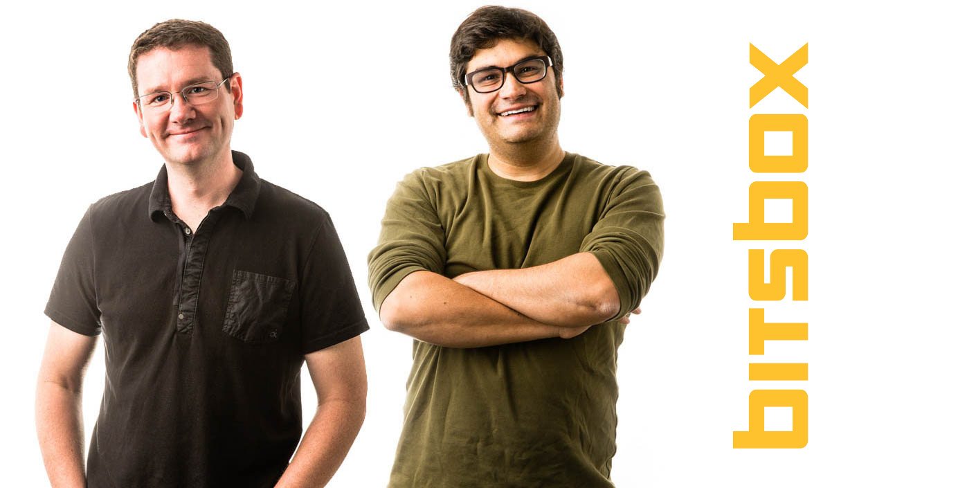 Bitsbox founders Scott Lininger and Aiden Chopra stand confidently beside the Bitsbox logo.