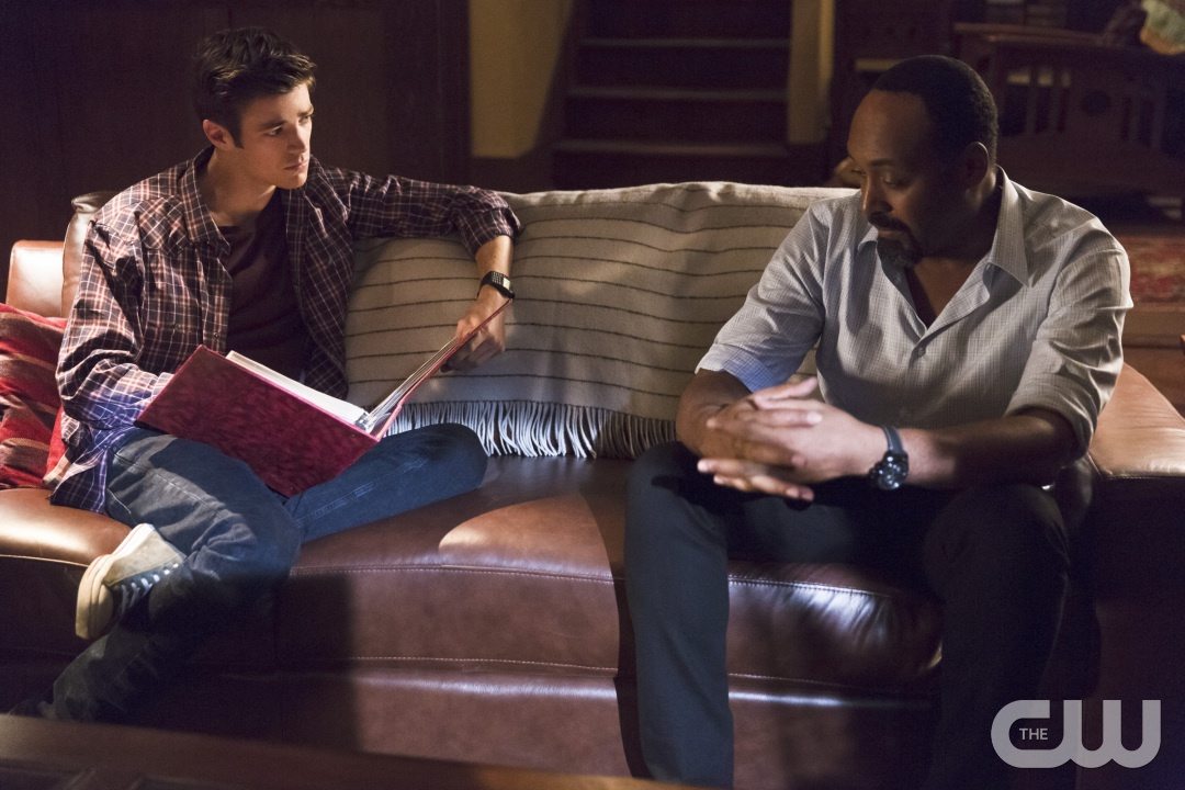 The Flash -- "Family of Rogues" -- Image FLA203a_0469b.jpg -- Pictured (L-R): Grant Gustin as Barry Allen and Jesse L. Martin as Detective Joe West -- Photo: Jeff Weddell/The CW -- Ã?Â© 2015 The CW Network, LLC. All rights reserved.