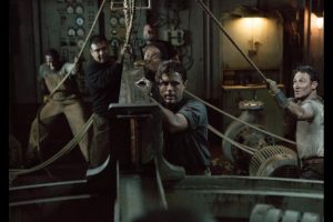 Ray Sybert (Casey Affleck) and the crew of the Pendleton try to keep their half of the oil tanker afloat. Photo © Disney.