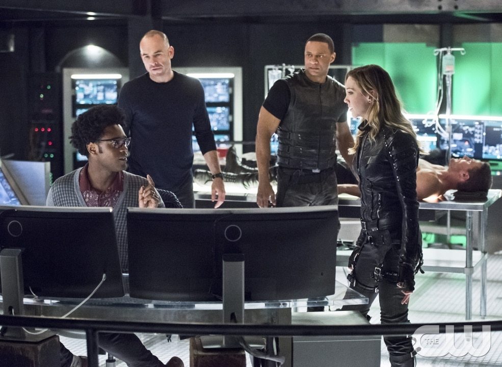 Arrow -- "Beacon of Hope" -- Image AR417a_0432b.jpg -- Pictured (L-R): Echo Kellum as Curtis Holt, Paul Blackthorne as Detective Quentin Lance, David Ramsey as John Diggle, Katie Cassidy as Laurel Lance and Stephen Amell as Oliver Queen -- Photo: Dean Buscher/The CW -- Ã?Â© 2016 The CW Network, LLC. All Rights Reserved.