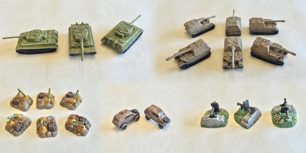 Five painted Memoir '44 miniatures with dry brushing completed.