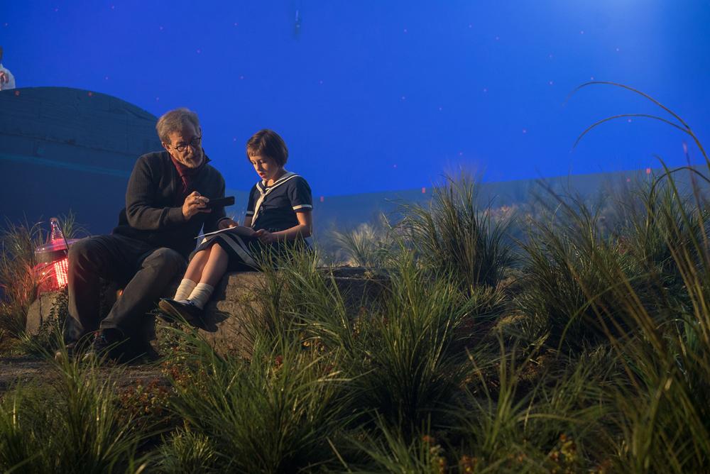 Director Steven Spielberg and Ruby Barnhill on the set of Disney's THE BFG, based on the best-selling book by Roald Dahl.