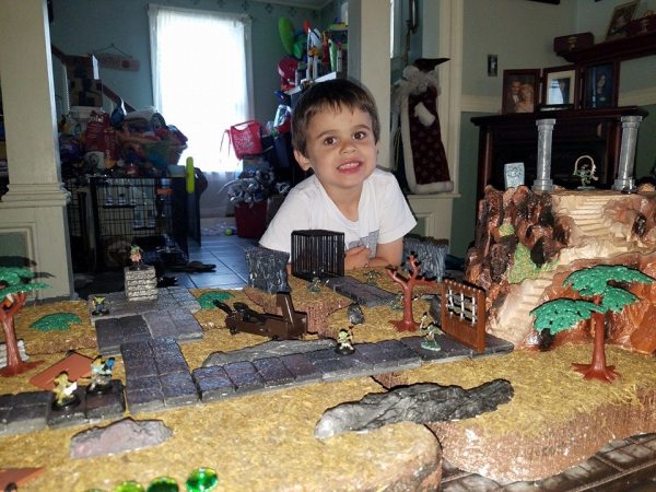 My Son Nicholas enjoying a bit of Goblin gaming with his New Tiles