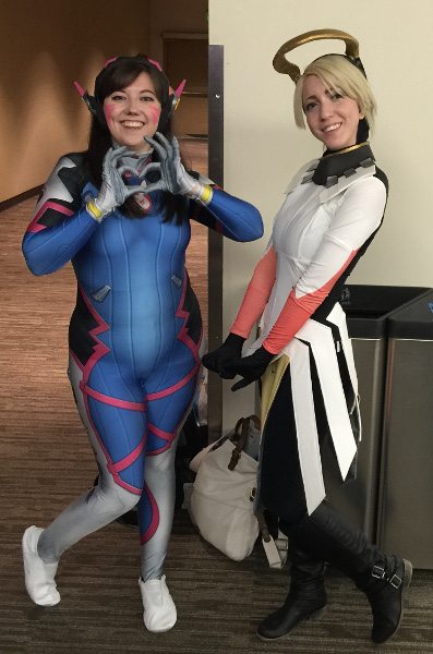 A D.VA and Mercy pose side by side in Overwatch cosplay at PAX West 2016