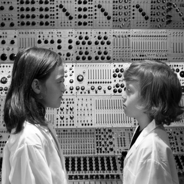 The artists' kids in front of the Buchla. Photo courtesy of VeryRecords