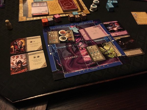 Player Mat populated with cards and dice during a game of Manaforge