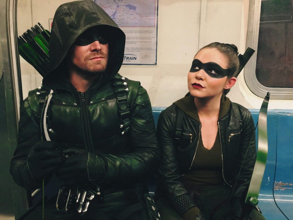 Oliver (Stephen Amell) and Evelyn (Madison McLaughlin) enjoy Star City's public transit system. Photo courtesy of Madison McLaughlin