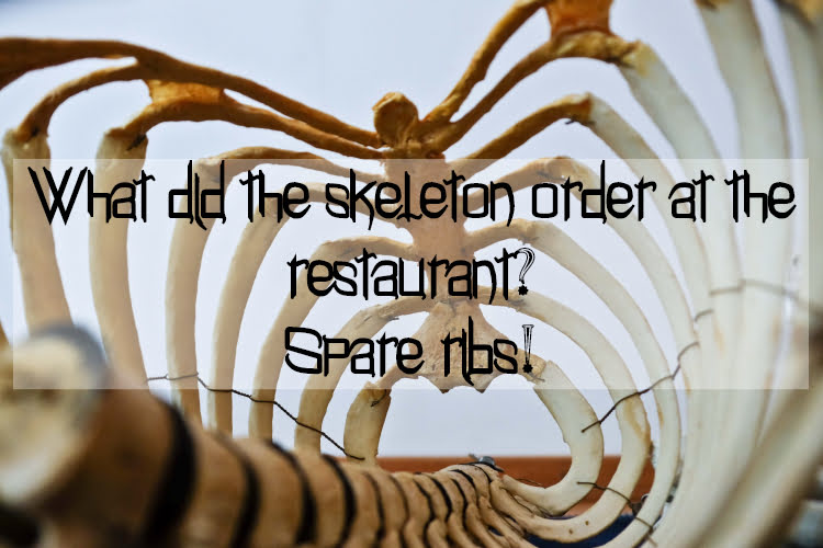 Skeleton ribcage with text What did the skeleton order at the restaurant? Spare ribs!