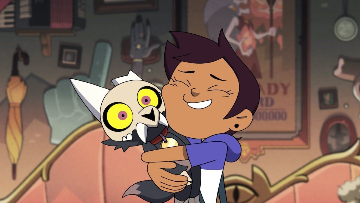 Luz surprises the tiny warrior, King, with a hug on Disney's 'The Owl House'.Image Credit: Disney Channel