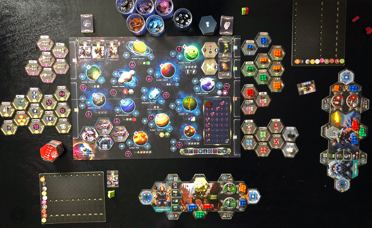 Overhead photo of the tabletop with all of the game components ready to begin a two player session with the expansion.