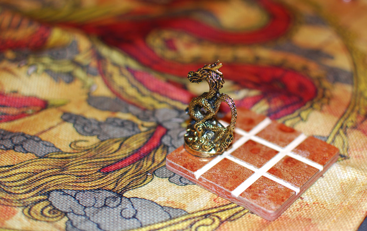Tsuro Luxury Limited Edition dragon pawn on tile